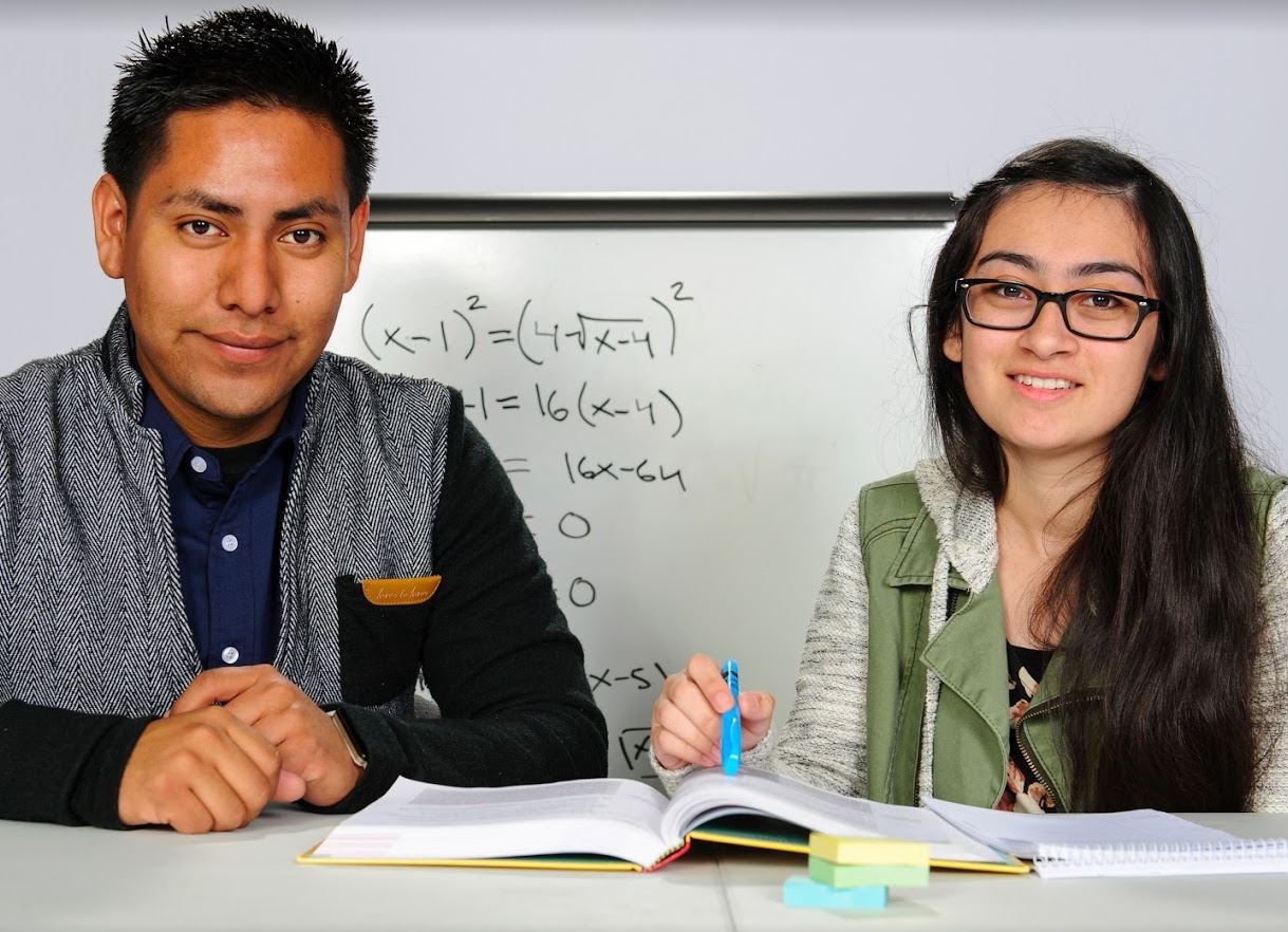 Man studying with woman