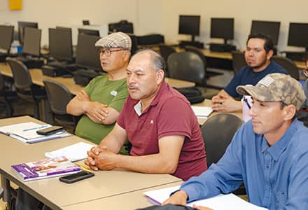 Men sitting in a classroom