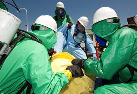 People in hazard suits