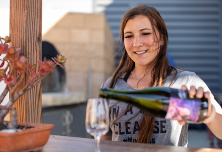 Woman pouring wine